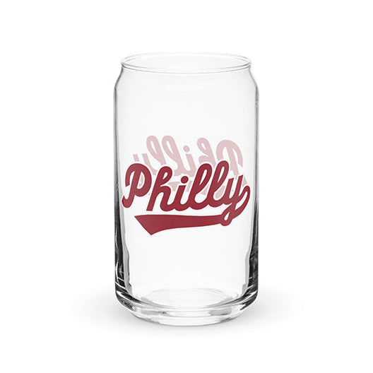 A clear pint glass with the word &