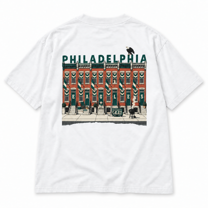 Birds on the Block Tee in white — back view, full back print of illustrated South Philly rowhouses dressed for game day with PHILADELPHIA across the roofline, Philly Drinkers. 