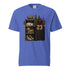A royal blue short-sleeve crewneck t-shirt featuring a detailed graphic print on the front. The graphic depicts a dark locker shelf with a baseball cap, a basketball, a baseball bat, and sneakers, topped with a gold crown, next to a dark brown sports jersey with the number 23.